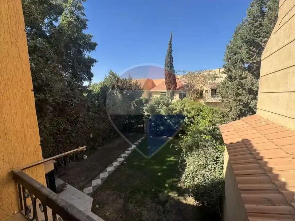 Middle townhouse in Mena Garden City