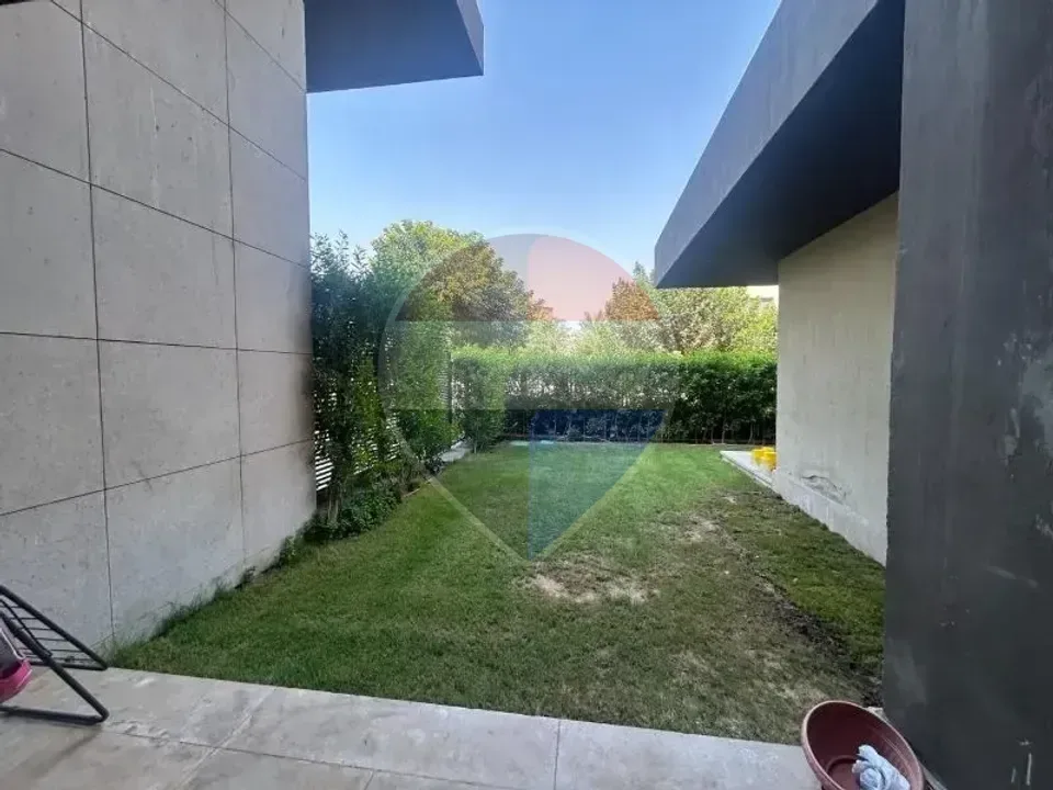 شقة ارضي بحديقة تشطيب كامل في امبرفيل