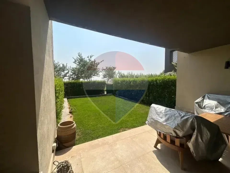 شقة ارضي بحديقة تشطيب كامل في امبرفيل