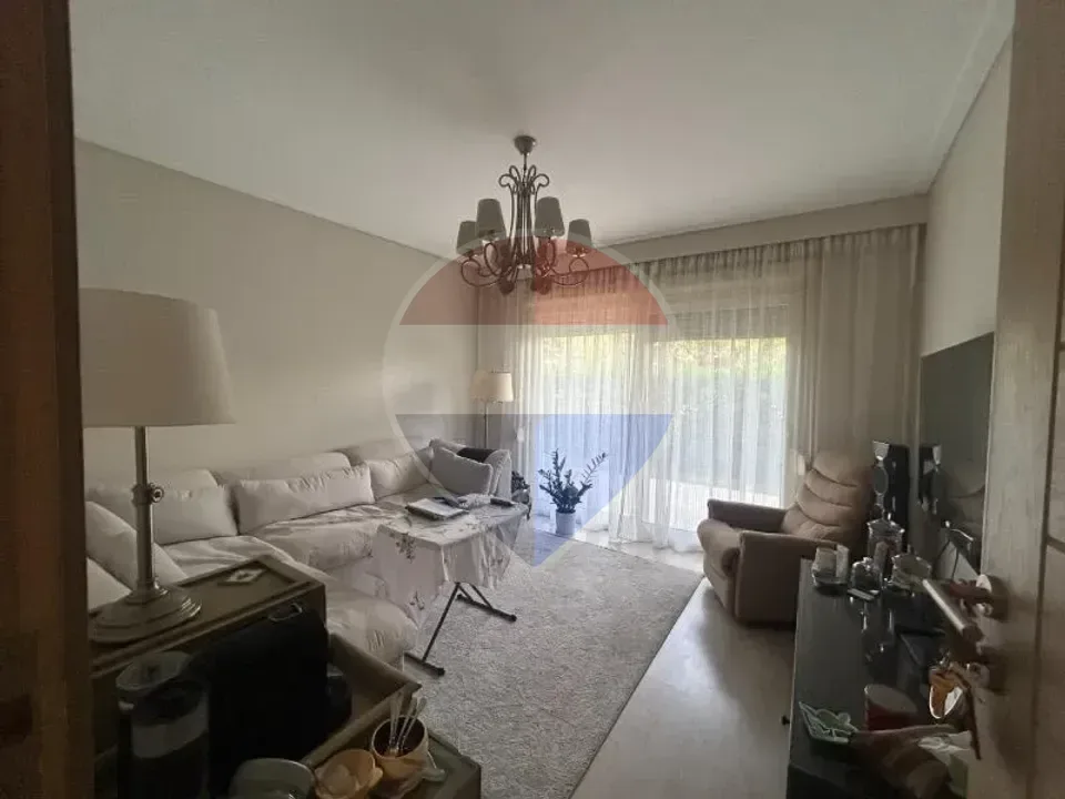 شقة ارضي بحديقة تشطيب كامل في امبرفيل