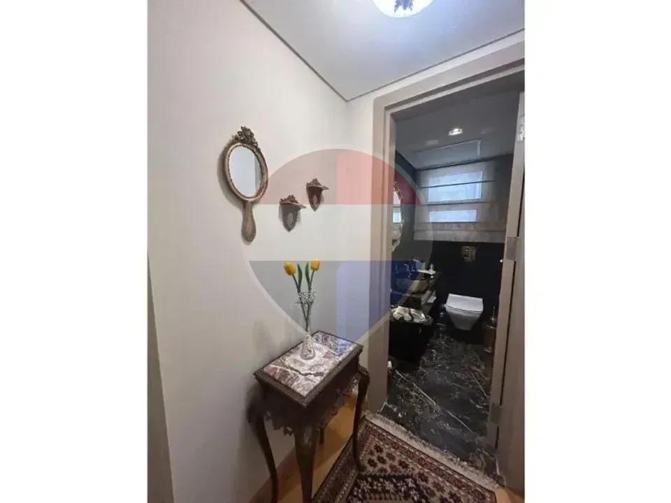 شقة ارضي بحديقة تشطيب كامل في امبرفيل