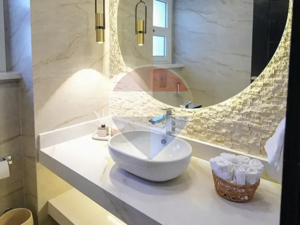 For Sale in New Giza ...... Amberville Apartment with a Stunning view of the landscape and lake