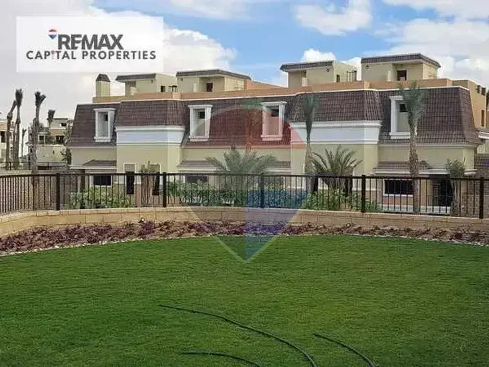 Own a corner villa in a prime location with a private garden and open views of green spaces, Sarai Compound